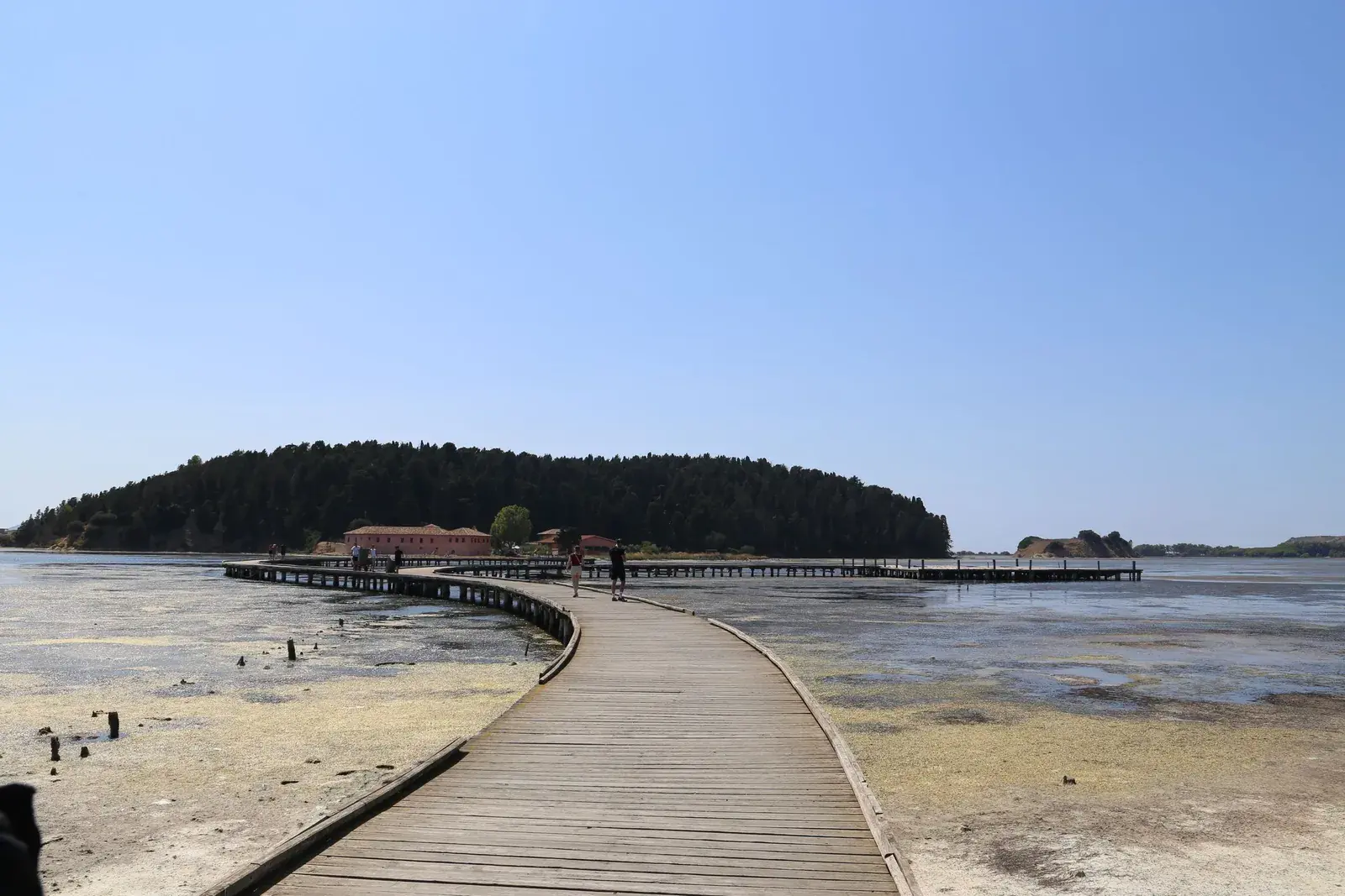 The wooden boardwalk in Zvërnec leading to the monastery islet