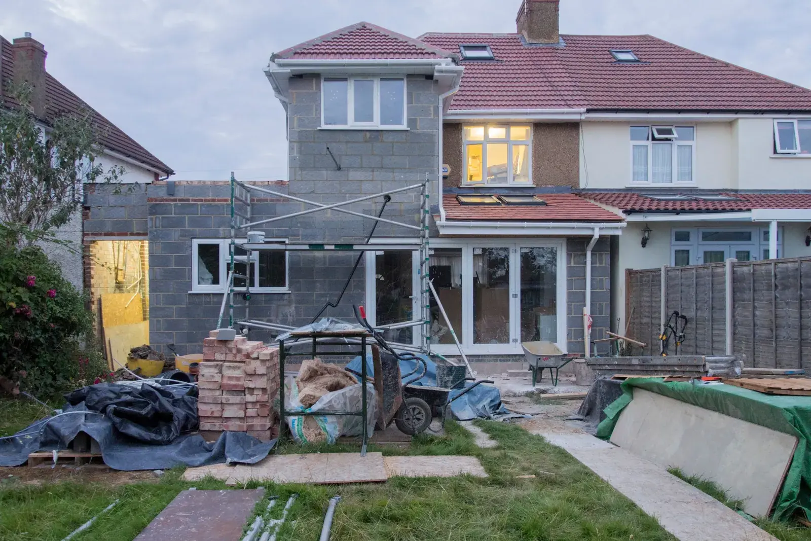 An extension under construction at the back of an existing house