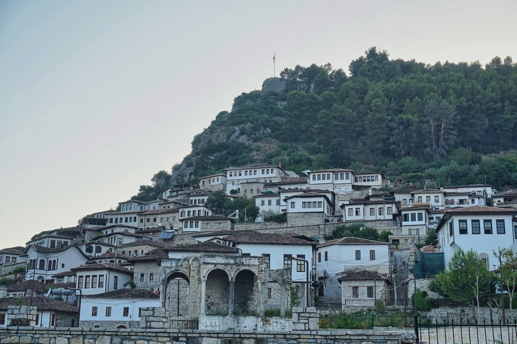 A group of houses sitting on top of a hill
