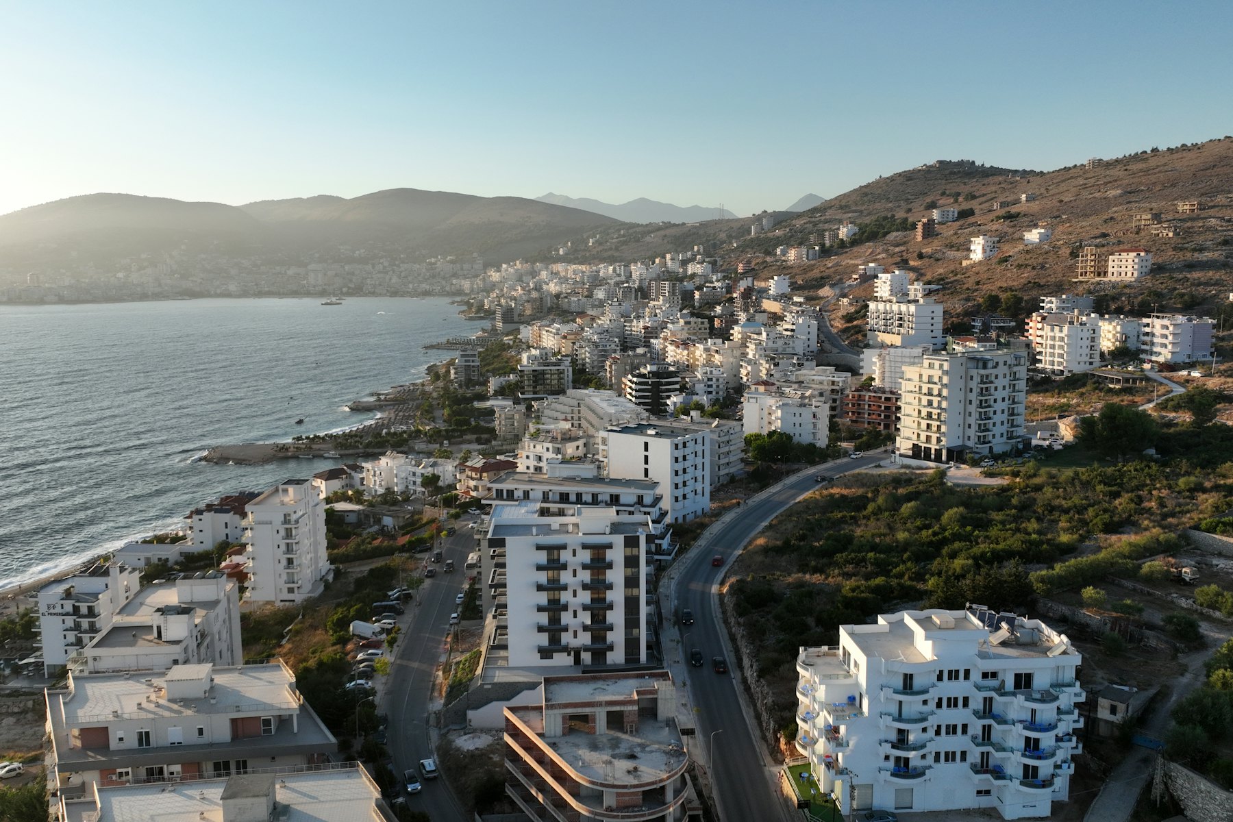 Coastal city with buildings along the sea