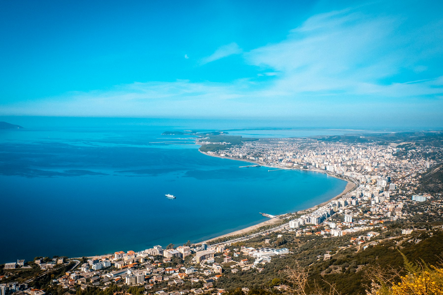 Coastal city with ocean and a clear blue sky
